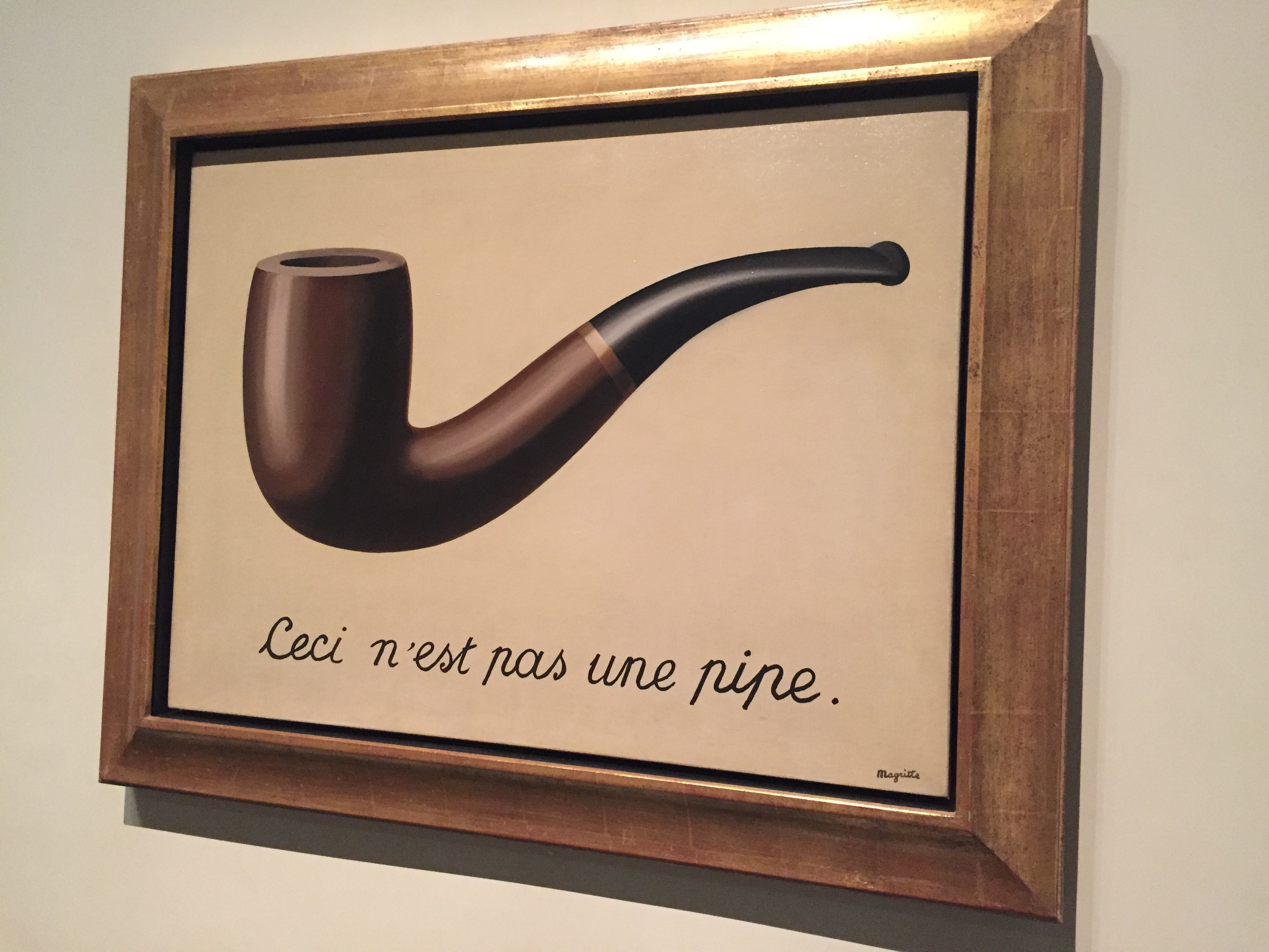 The Treachery of Images (This Is Not a Pipe) painting by René Magritte